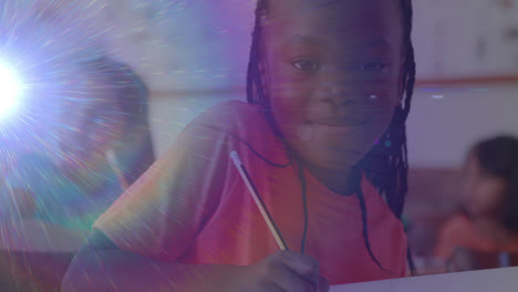 Animation-of-portrait-of-happy-mixed-race-schoolgirl-writing-during-lesson-and-smiling-to-camera