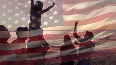 Group-of-friends-at-the-beach-and-the-American-flag-for-fourth-of-July.