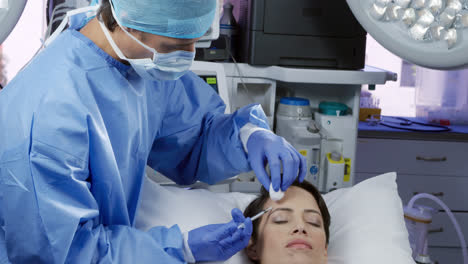 Patient-and-surgeon-during-a-cosmetic-procedure