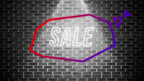 Sale-graphic-in-purple-thought-bubble-on-a-grey-brick-wall