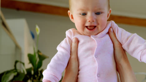 Parents-having-fun-with-baby-on-bed-at-home-4k