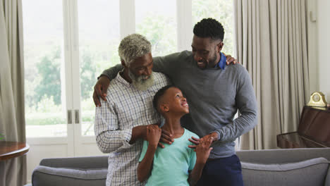 Mixed-race-man-spending-time-with-his-father-and-his-son