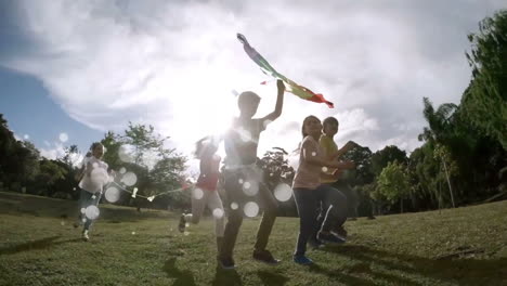 Puntos-De-Luz-Blanca-En-Movimiento-Con-Niños-Corriendo