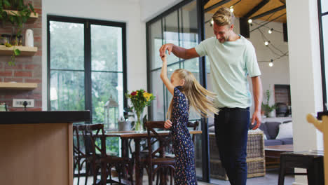 Father-and-daughter-dancing-together