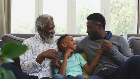 Mixed-race-man-spending-time-with-his-father-and-his-son