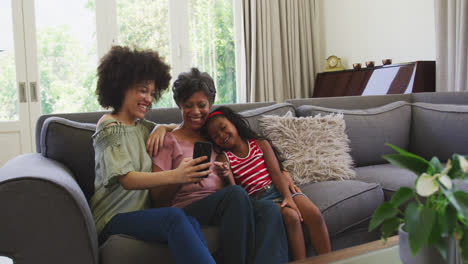 Mixed-race-woman-spending-time-with-her-mother-and-her-daughter