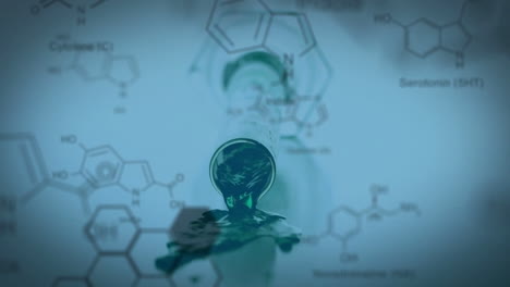 Test-tube-falling-with-data-and-structural-formula-of-chemical-compounds-in-the-foreground