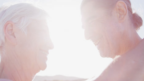 Senior-Caucasian-couple-enjoying-time-at-the-beach