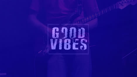 Animation-of-good-vibes-text-over-man-playing-the-guitar