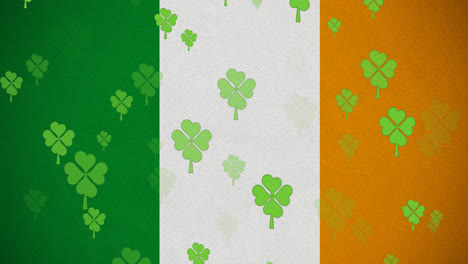 Digital-animation-of-multiple-clover-leaves-floating-against-irish-flag