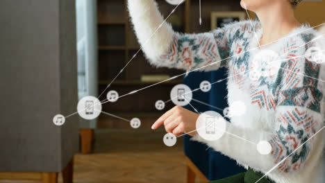 Animation-of-networks-of-connections-and-businesswoman-wearing-phone-vr-headset