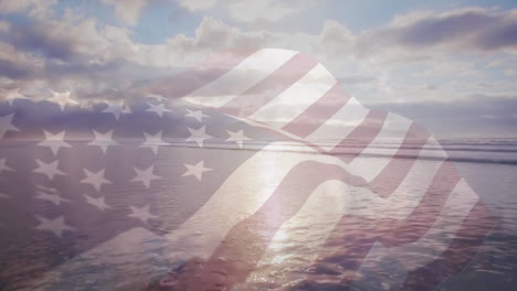 Animation-of-american-flag-waving-over-sunny-seaside