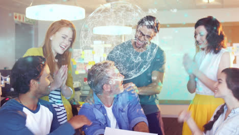 Animation-of-data-over-diverse-male-and-female-business-colleagues-clapping-hands-in-office