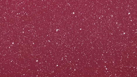 Animation-of-snow-falling-on-red-background