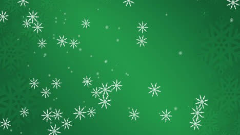 Animation-of-snow-falling-on-green-background