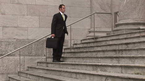 Man-on-Steps-of-Building