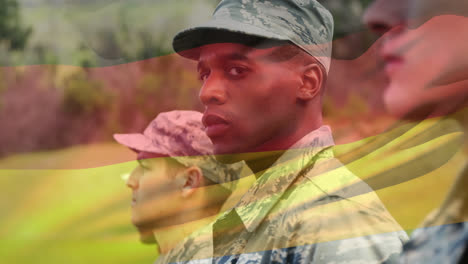 Animation-of-flag-of-germany-waving-over-diverse-soldiers