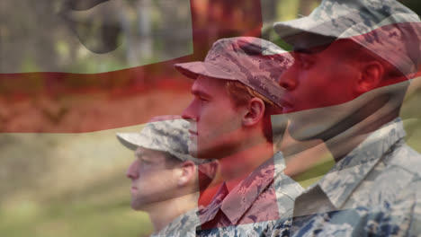 Animation-of-flag-of-england-waving-over-diverse-soldiers