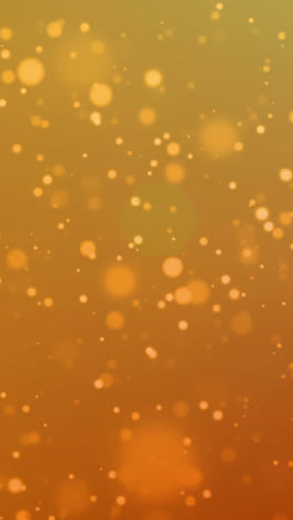 Animation-of-light-and-orange-spots-on-orange-background