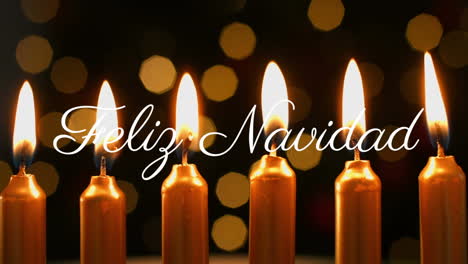 Animation-of-feliz-navidad-over-christmas-candles