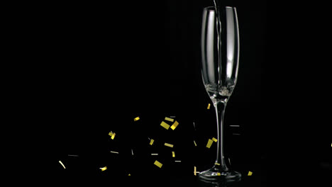 Animation-of-gold-confetti-falling-over-chmpagne-glass-on-black-background