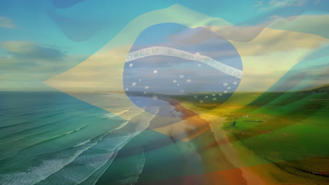 Digital-composition-of-waving-brazil-flag-against-aerial-view-of-beach-and-sea-waves