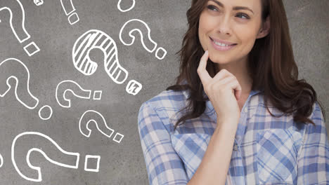 Animation-of-smiling,-thoughtful-caucasian-woman,-with-question-marks-on-chalkboard