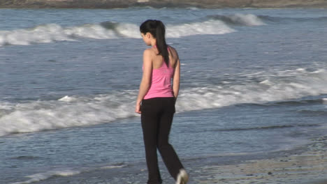 Woman-Enjoying-Beach-Life