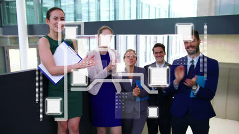 Animation-of-processor-over-diverse-male-and-female-business-colleagues-clapping-hands-in-office