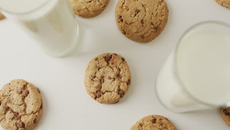 Video-of-biscuits-with-chocolate-and-milk-on-white-background