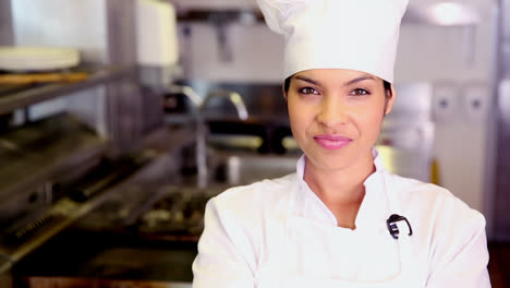 Pretty-chef-smiling-at-camera