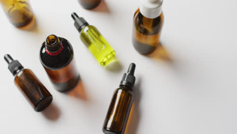 Close-up-of-dropper-serum-bottles-on-white-background-with-copy-space