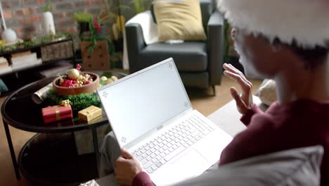 Happy-african-american-man-using-laptop-with-copy-space-for-video-call-at-home,-slow-motion