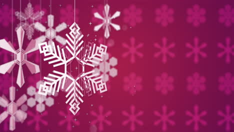 Animation-of-white-snowflakes-spinning-on-pink-background