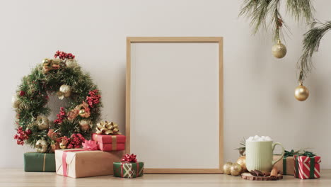 Video-of-christmas-decorations-and-wooden-frame-with-copy-space-on-white-background