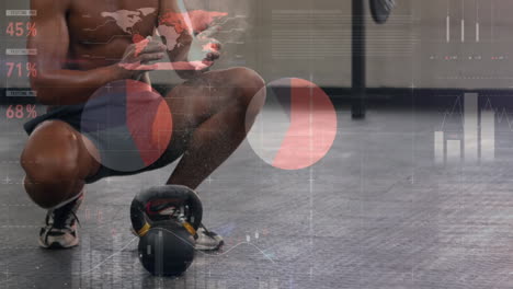 Animation-of-data-processing-over-african-american-fit-man-applying-chalk-to-hands-at-the-gym