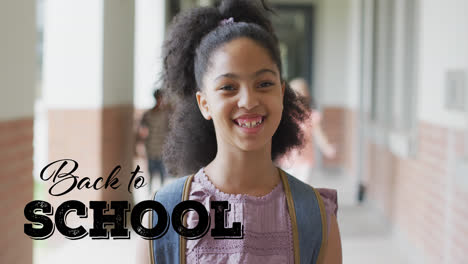 Animation-of-back-to-school-text-over-happy-biracial-schoolgirl-at-school