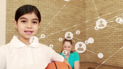 Animación-De-La-Red-De-íconos-De-Perfil-Sobre-Una-Chica-Birracial-Con-Baloncesto-Mostrando-El-Pulgar-Hacia-Arriba-En-La-Escuela