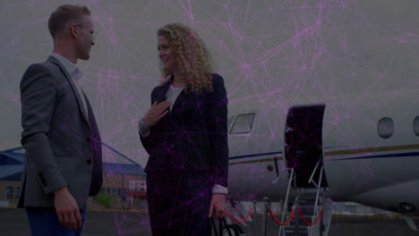 Animation-of-network-of-connections-over-caucasian-business-people-at-airport