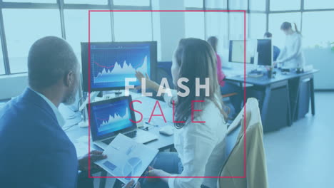 Animation-of-flash-sale-text-banner-against-diverse-man-and-woman-discussing-shaking-hands-at-office