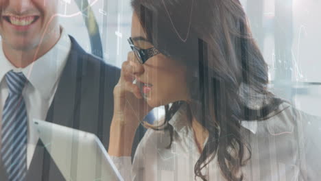 Animation-of-statistical-data-processing-over-biracial-businesswoman-talking-on-smartphone-at-office