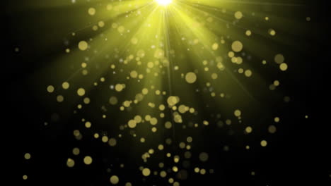 Animation-of-yellow-spots-and-bright-light-spot-against-black-background-with-copy-space