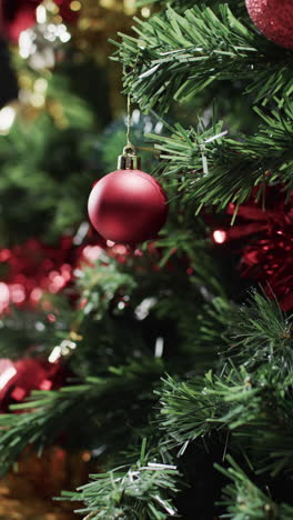Vertical-video-of-christmas-tree-with-decorations-and-copy-space