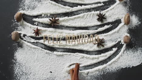 Texto-Feliz-Navidad-Sobre-árbol-De-Navidad-Dibujado-En-Harina-Sobre-Fondo-Negro