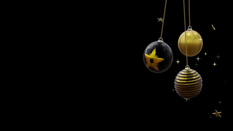 Black-and-gold-christmas-baubles-swinging-with-gold-stars-on-black-background,-copy-space