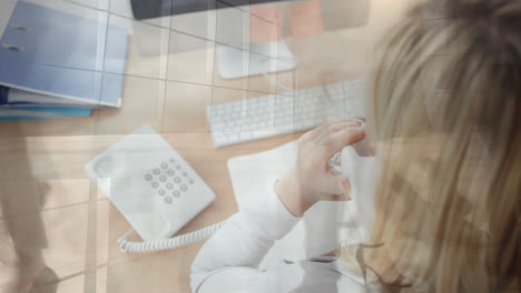 Animation-of-caucasian-businesswoman-using-computer-over-people-walking