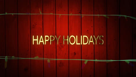 Animation-Von-Happy-Holidays-Text-Und-Lichterketten-Auf-Holzhintergrund