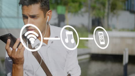 Animation-Eines-Flussdiagramms-über-Einem-Mann-Gemischter-Abstammung,-Der-Kopfhörer-Trägt-Und-Den-Sprachassistenten-Auf-Seinem-Mobiltelefon-Nutzt