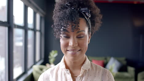 Portrait-of-african-american-business-woman-in-office-with-copy-space