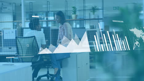 Animation-of-graphs,-loading-bars-and-map-over-diverse-coworkers-discussing-on-desk